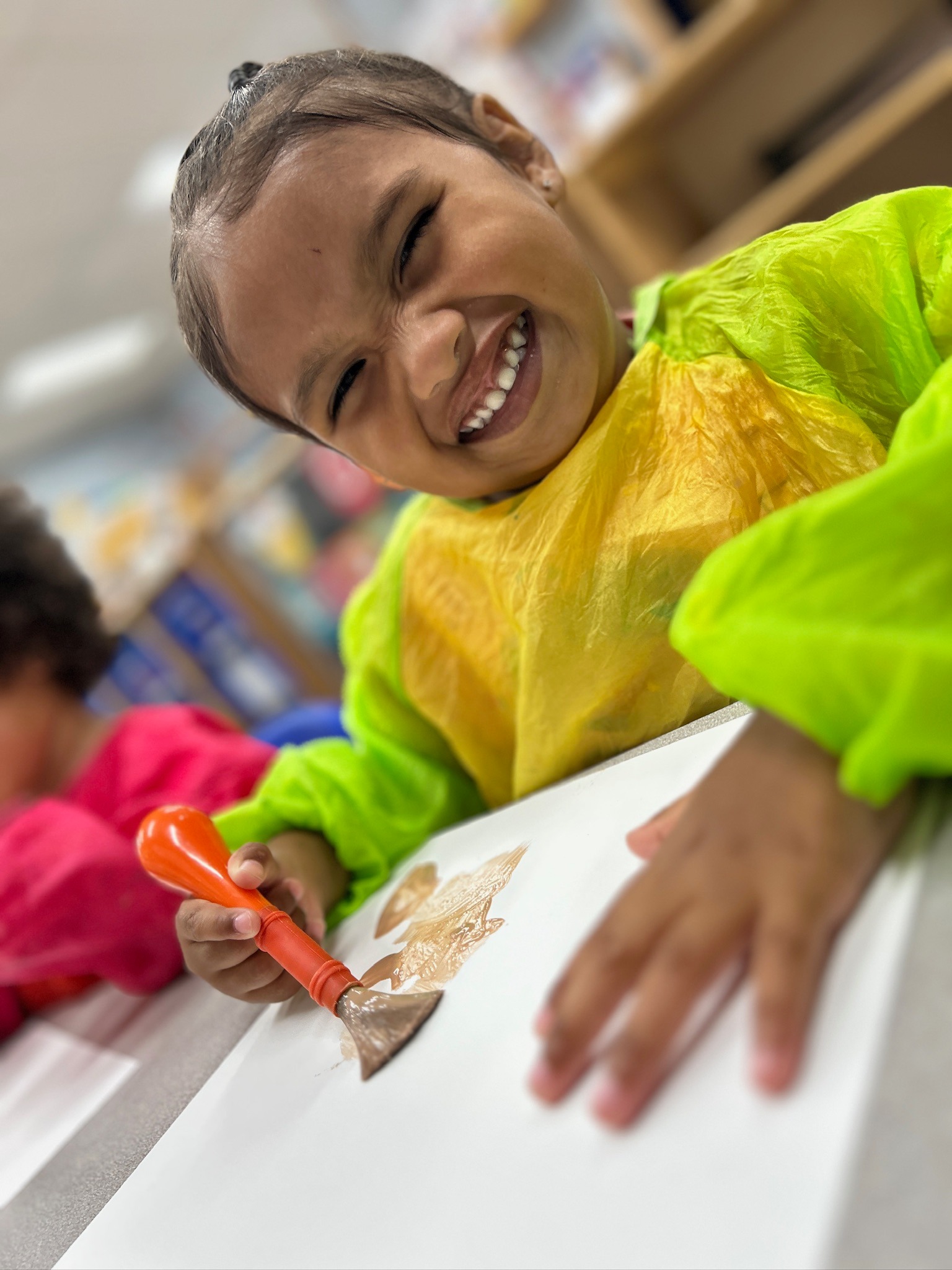 Child painting during art time