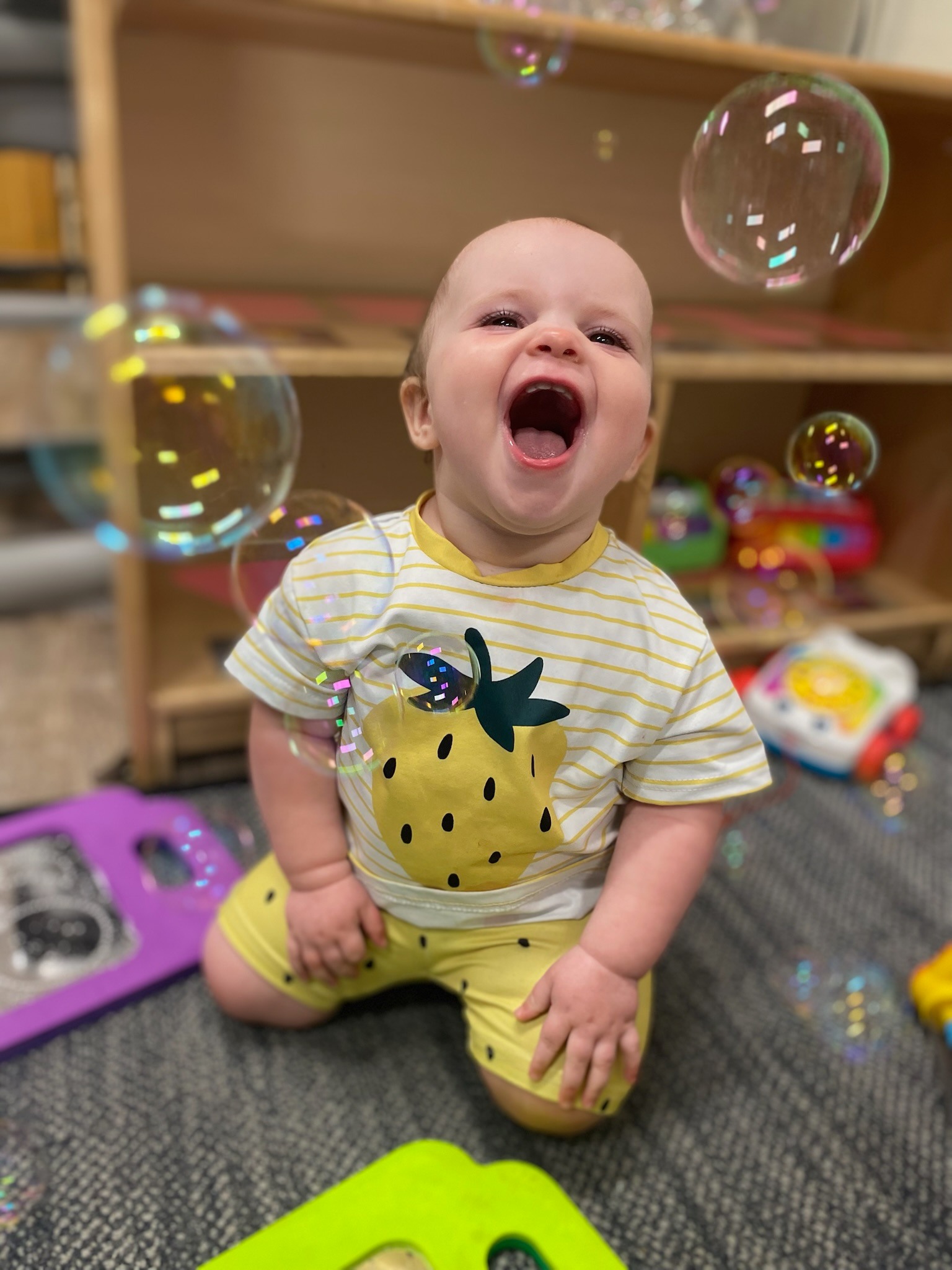Baby enjoying bubble play