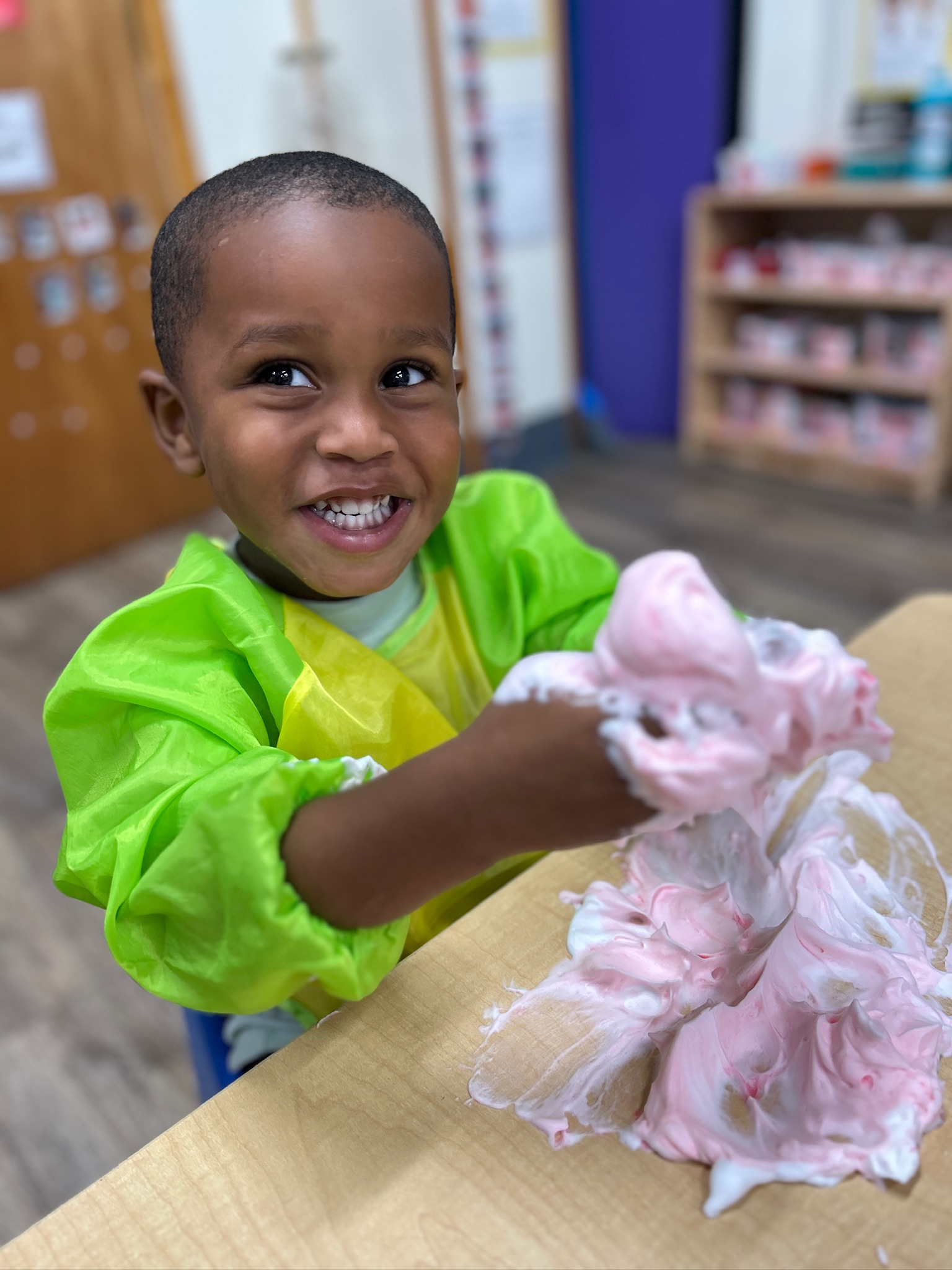 Toddler playing with shaving cream sensory activity